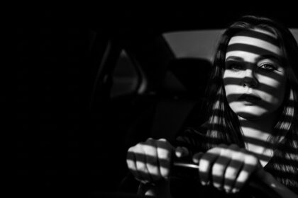 dramatic shadow portrait visual for Engine Running by Luke Ai Music representing emotional tension and unresolved conversation