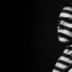 dramatic shadow portrait visual for My Throat Closed by Luke Ai Music representing emotional silence and internal tension