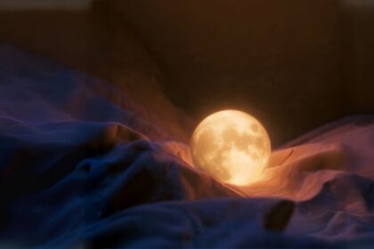 Soft Place to Land by Luke Ai Music artwork showing a glowing moon resting in soft flowing fabric symbolizing calm, healing, and emotional comfort