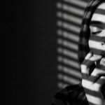 dramatic shadow portrait visual for Taste The Salt by Luke Ai Music symbolizing nostalgic memories and quiet reflection